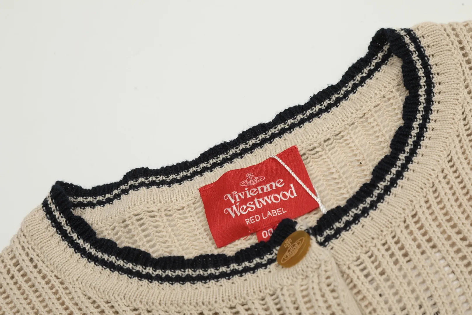 VIVI119# vivienne west wood West Queen Vivian Saturn New Retro "Unisex" Hollow Design Knitted Sweater Wool Round Neck 2024 Spring Latest Style Size: S -M- L Color: Apricot Royal Blue